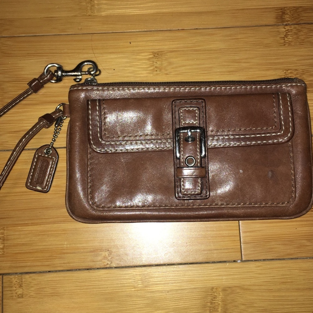 Brown leather coach wristlet